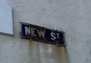 An old street sign for New Street