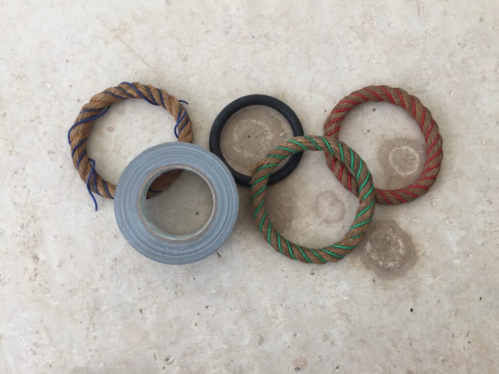 Dystopian-Olympic-Rings-by-John-Griffiths-Colby