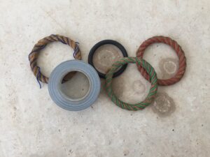 Dystopian-Olympic-Rings-by-John-Griffiths-Colby